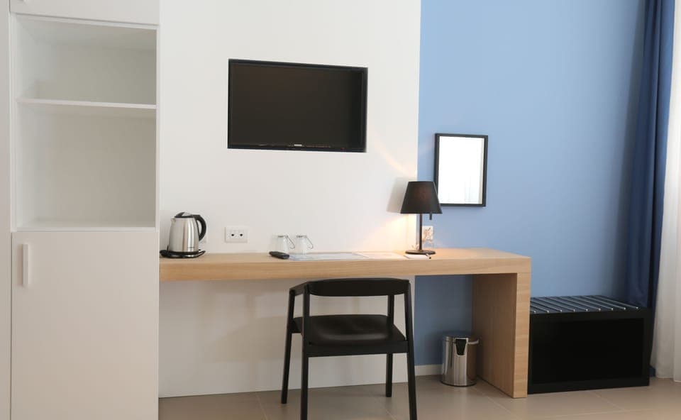 Deluxe Double Room, City View | Living area | LCD TV