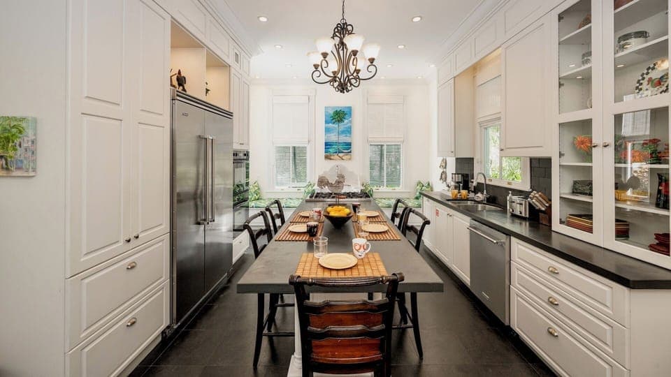 The kitchen bar seating is perfect for a quick bite or keeping the cooks company...