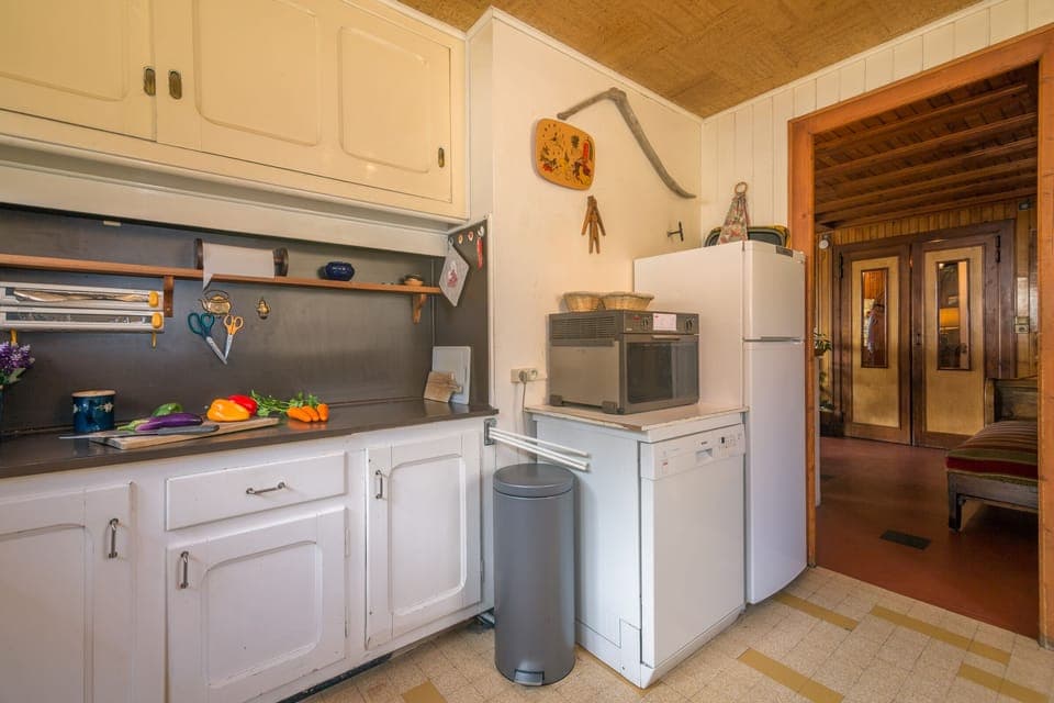 Kitchen with entrance to the living room