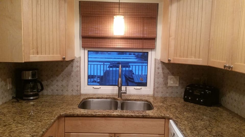 kitchen window overlooking balcony