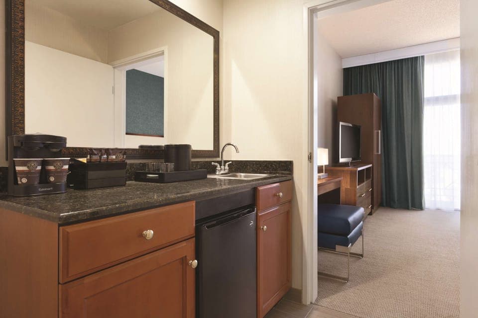 Larger King Suite | 1 bedroom, in-room safe, iron/ironing board, free cribs/infant beds