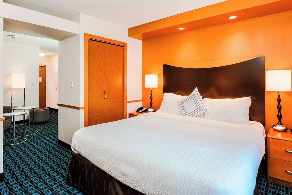 Hypo-allergenic bedding, down comforters, desk, laptop workspace