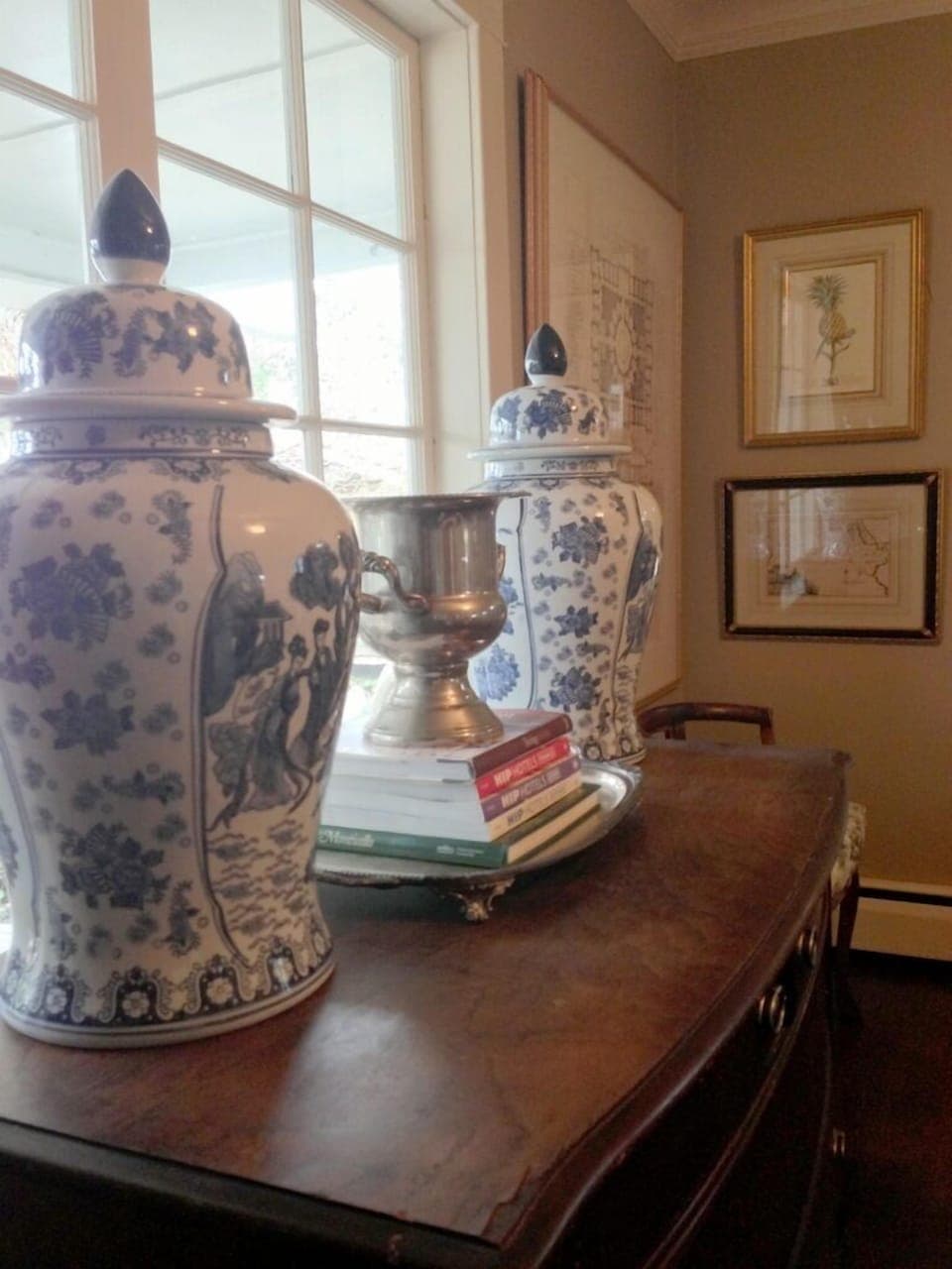 Dining room Chinese urns at Del Mar Cottage.