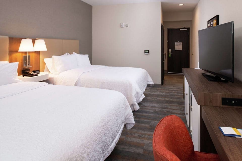 Desk, laptop workspace, blackout drapes, iron/ironing board