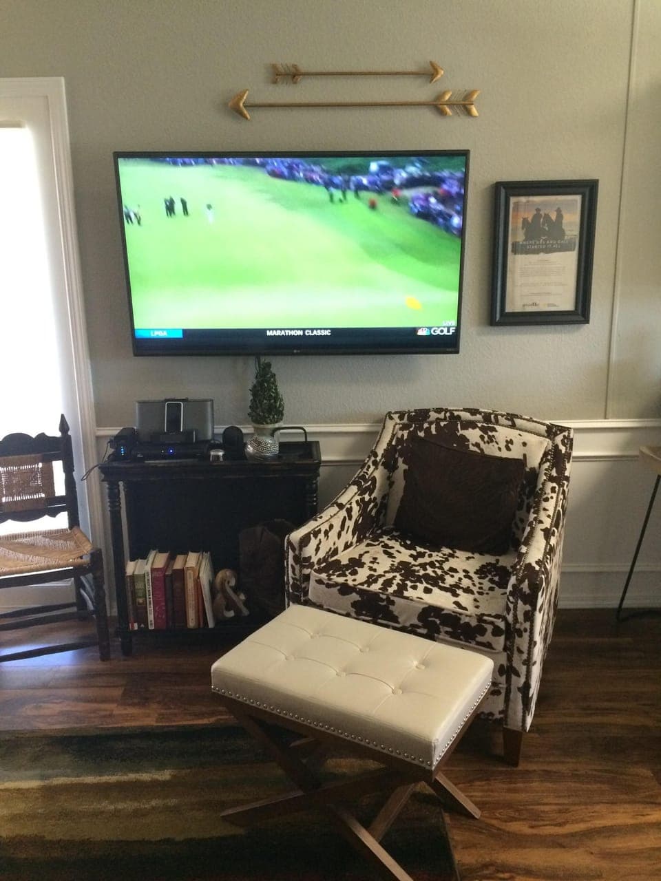 A 55” TV for relaxing with movie and sports options.