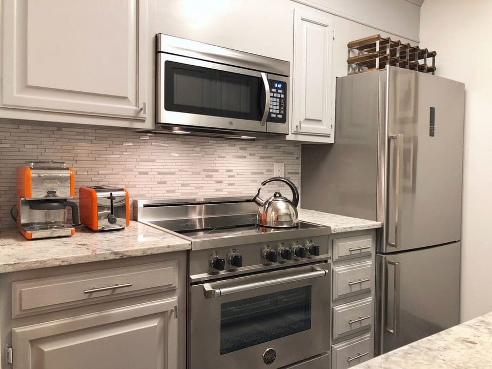 Kitchen. Induction range cooks much faster than regular electric one