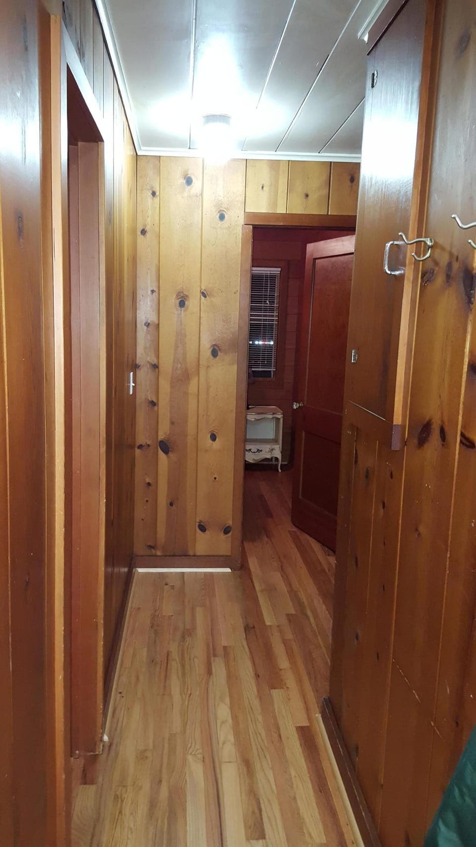  Hardwood floor hallway leading to N. bedrooms