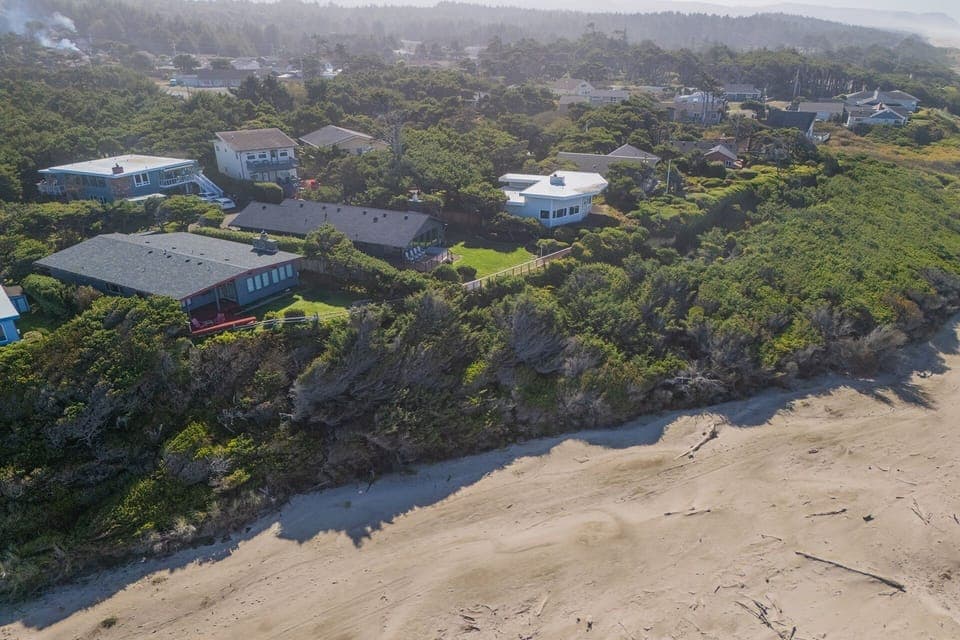 Located on a bluff overlooking the Alsea Bay and the Pacific Ocean.