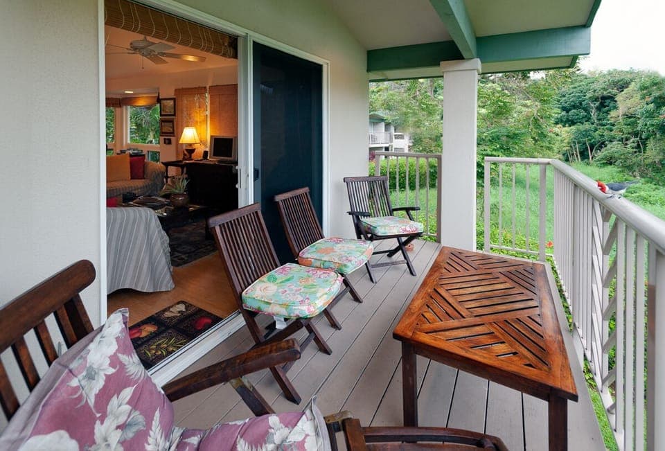 Villas of Kamali'i 37 is spacious and beautiful home away from home! There are three separate private lanais for you to enjoy the scenery from, pictured here is the living room lanai, with a special visit from a red crested cardinal!