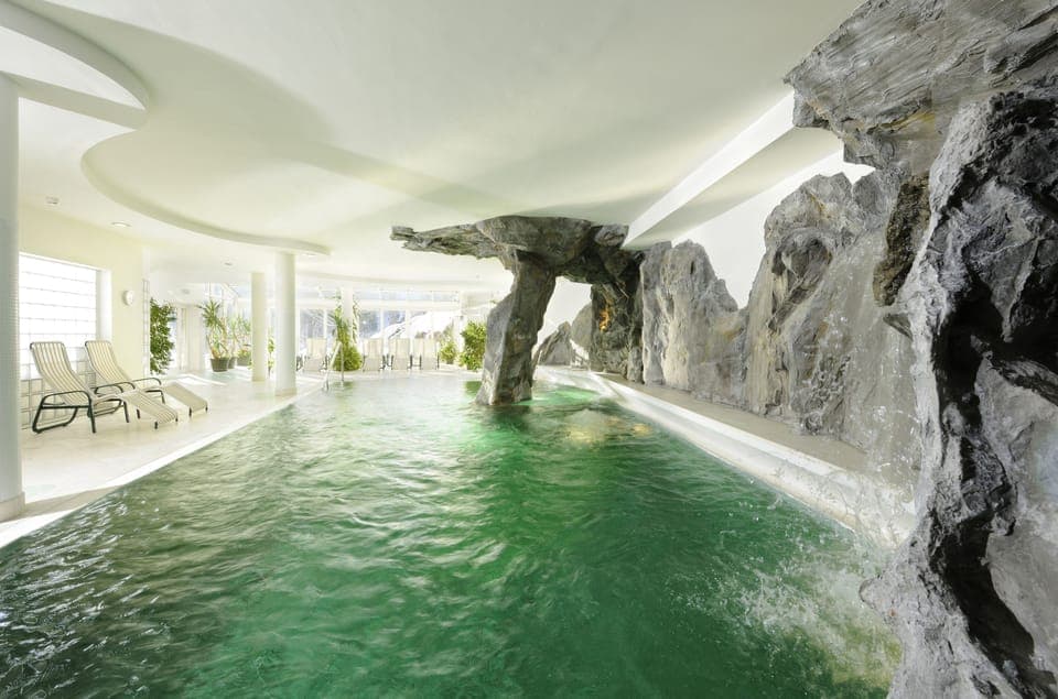 Indoor pool, seasonal outdoor pool, pool umbrellas, sun loungers