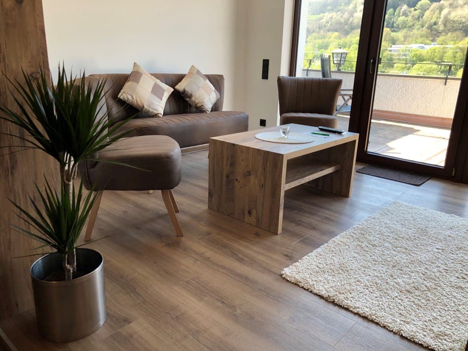 Junior Suite, Balcony | Living area | Flat-screen TV