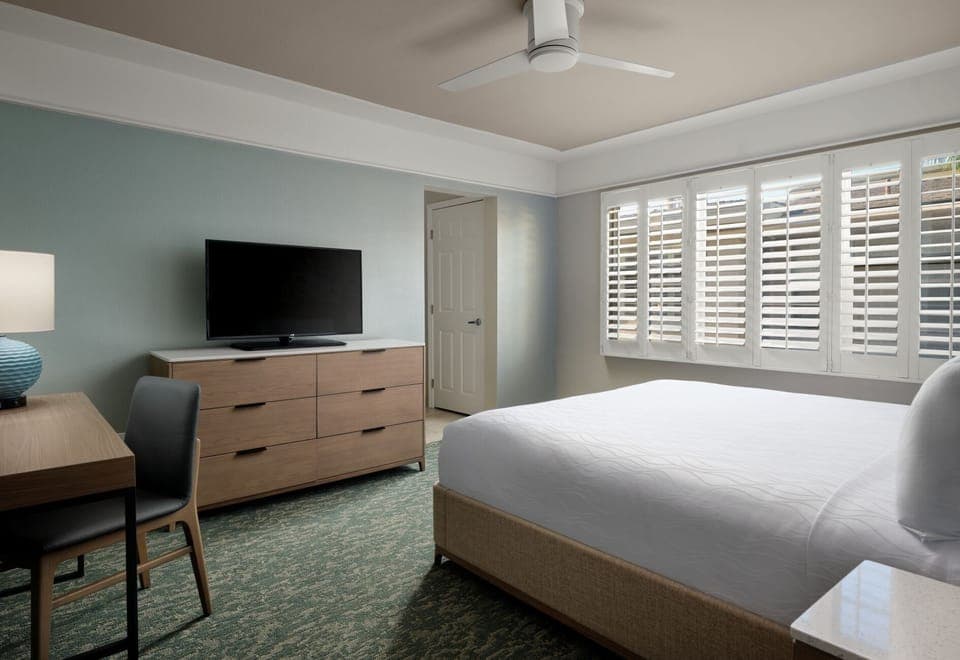 Desk, blackout drapes, iron/ironing board, cribs/infant beds