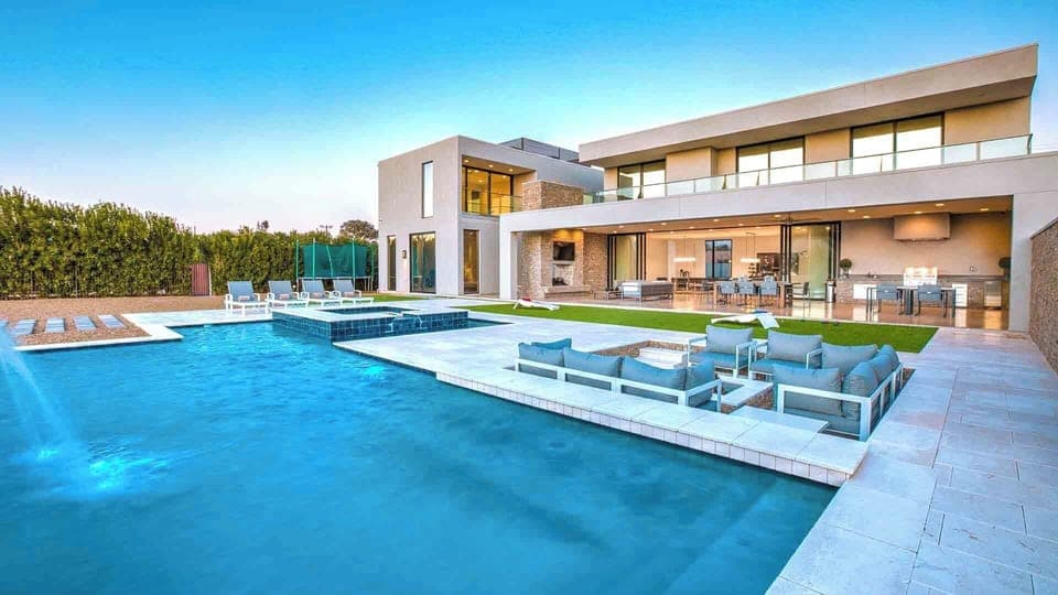 Backyard retreat with pool, fire pit, and open-air dining for pure relaxation."