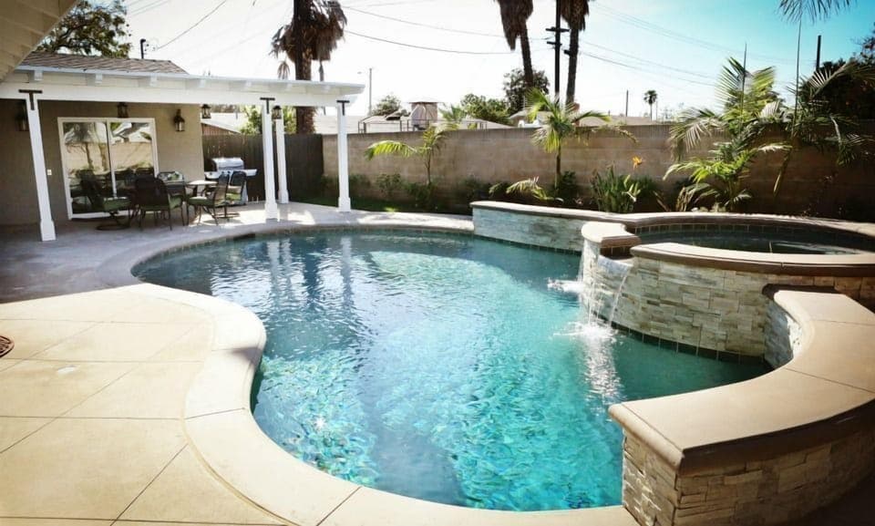 Stunning In-ground Pool and Jacuzzi with Waterfall Features