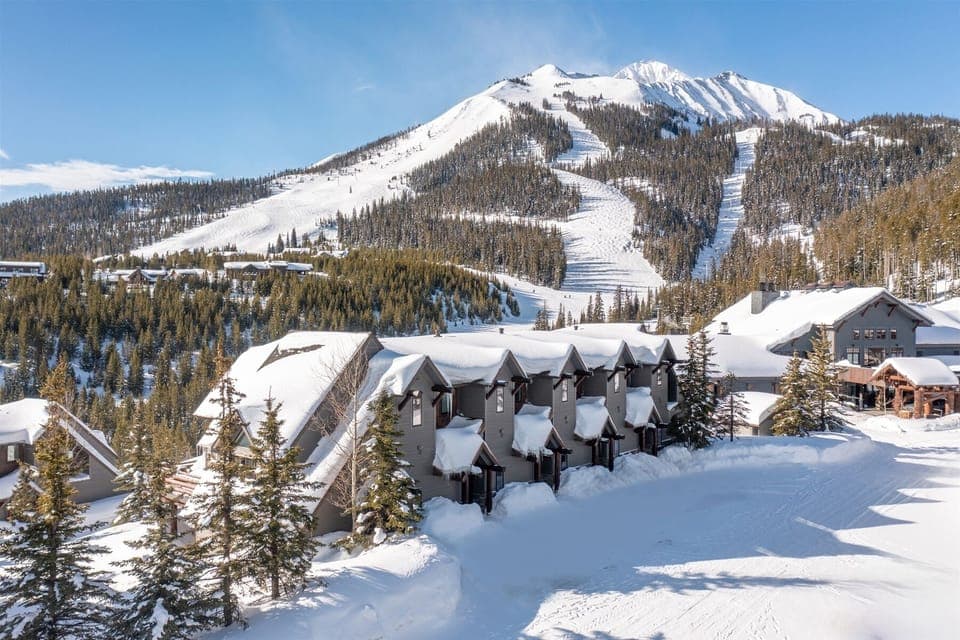 View of Saddle Ridge A building with Lone Peak & ski slopes in the background