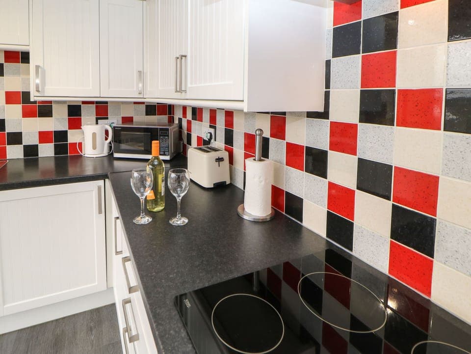 Cottage | Private kitchen | Fridge, dishwasher, highchair, cookware/dishes/utensils