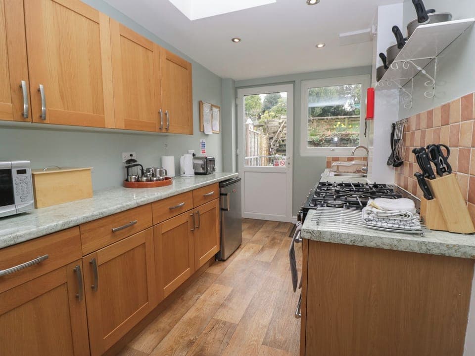 Dishwasher, highchair, cookware/dishes/utensils