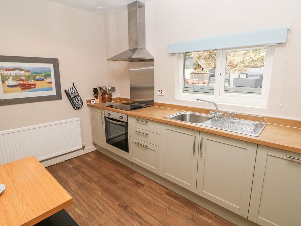 Cottage | Private kitchen | Fridge, dishwasher, highchair, cookware/dishes/utensils