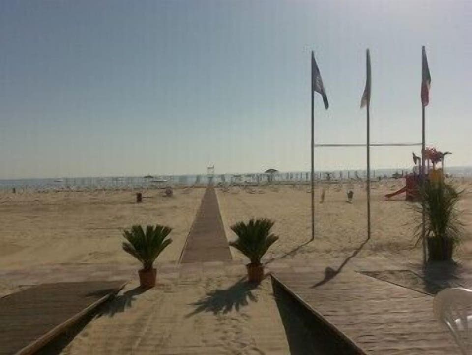 Sun loungers, beach umbrellas, beach towels