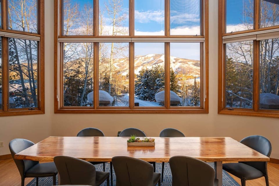 Room for eight at the dining room table with sweeping vistas