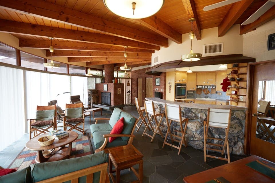 View of living room and bar/kitchen