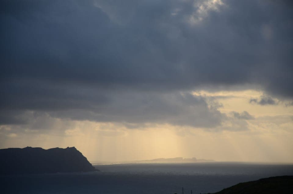Tory island and Hornhead, sunlight through the cloud 