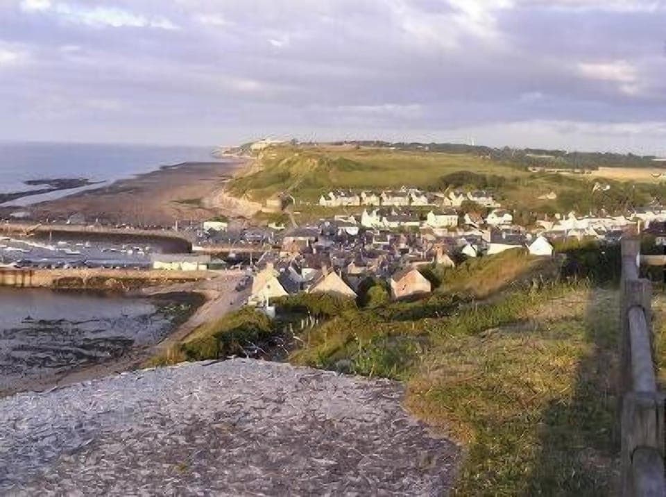 Cliffs and west part of PORT EN BESSIN HUPPAIN.