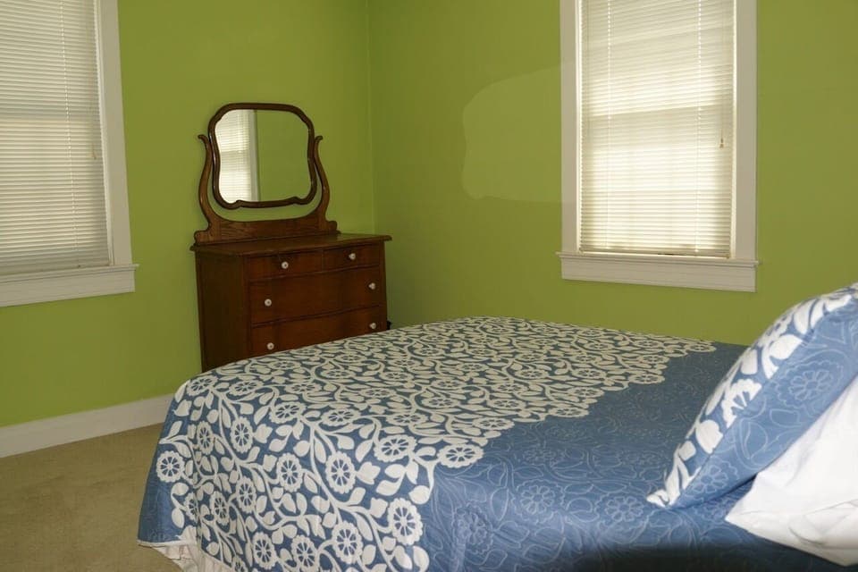 Bedroom 2 with a comfortable full size bed and plenty of views & morning light.