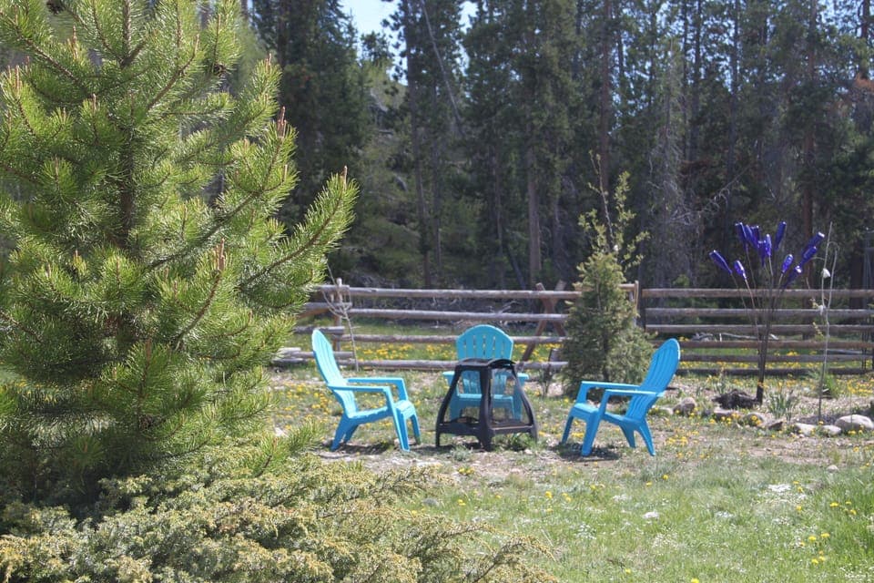 Private outdoor courtyard with fire pit, BBQ grill,  and eating area