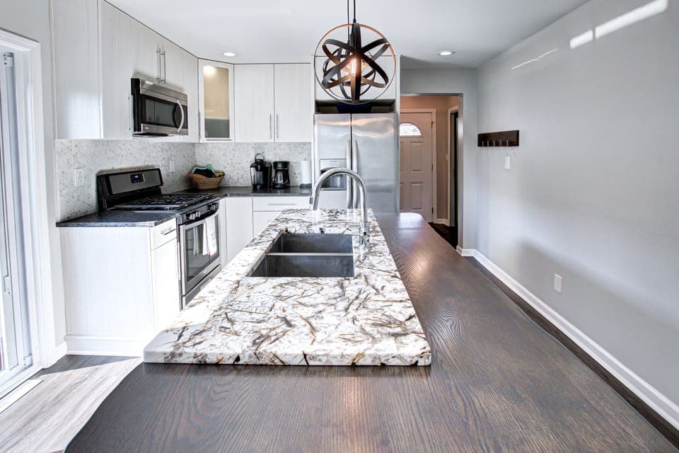 Beautiful granite countertops with live wood edge.