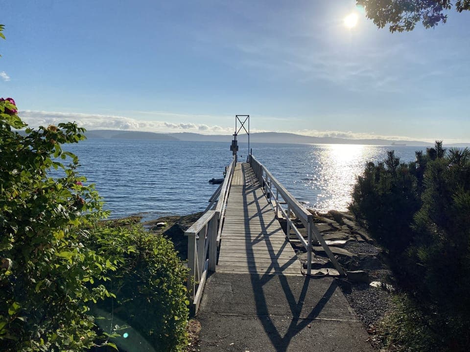 Private dock offers moorage for boats up to 30'