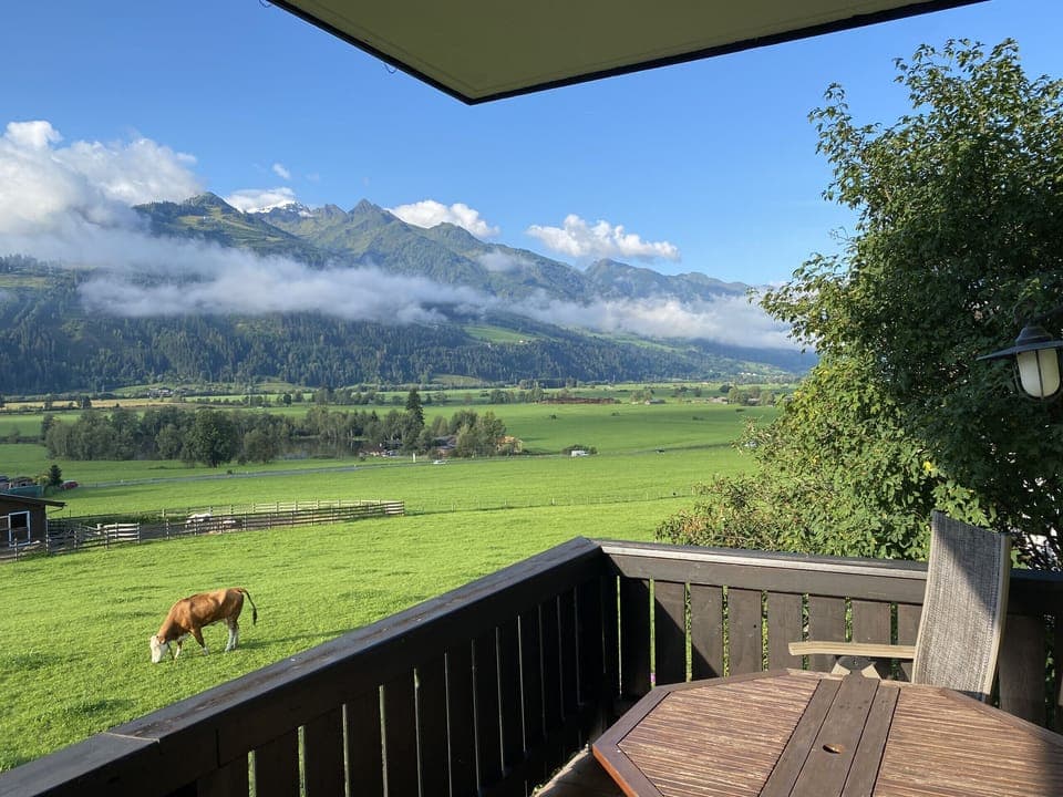 View from the balcony of Mountain View apartment in Kaprun, Austria of mountains on a sunny day