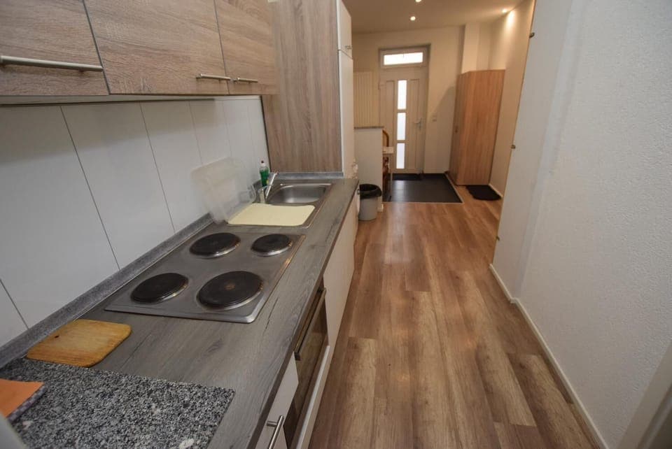 Fridge, stovetop, coffee/tea maker, cookware/dishes/utensils