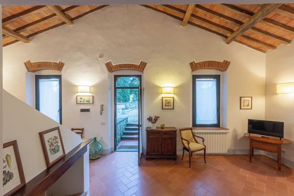 Apartment, 2 Bedrooms, Garden View (Pomaio) | Living area | Flat-screen TV