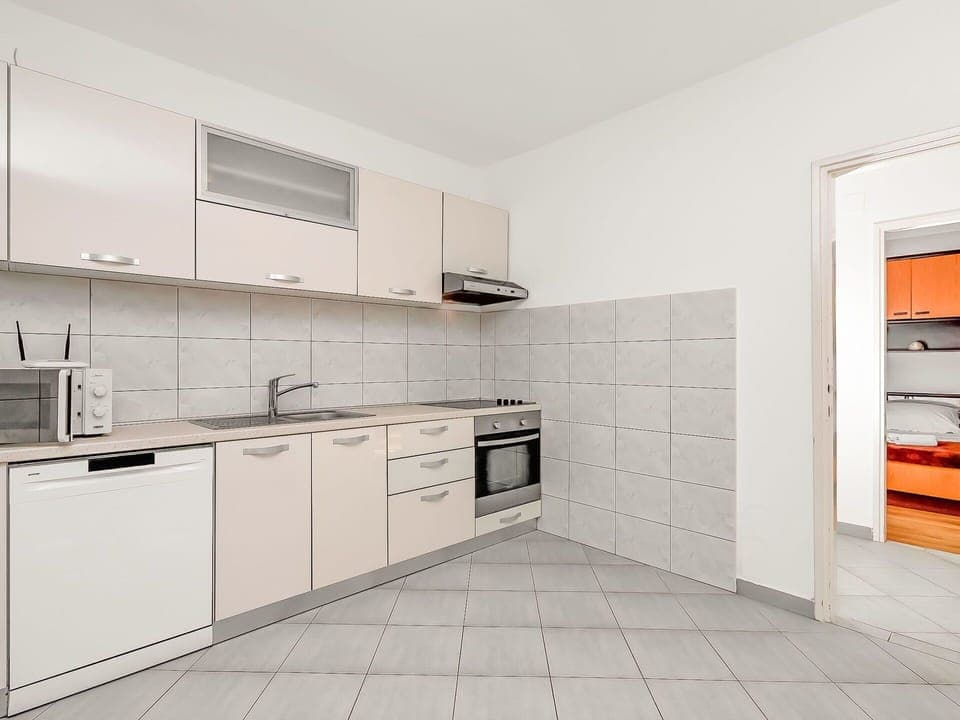 Room, Property, Furniture, Cabinetry, Kitchen, Countertop, Interior Design, Tile, Floor, Real Estate