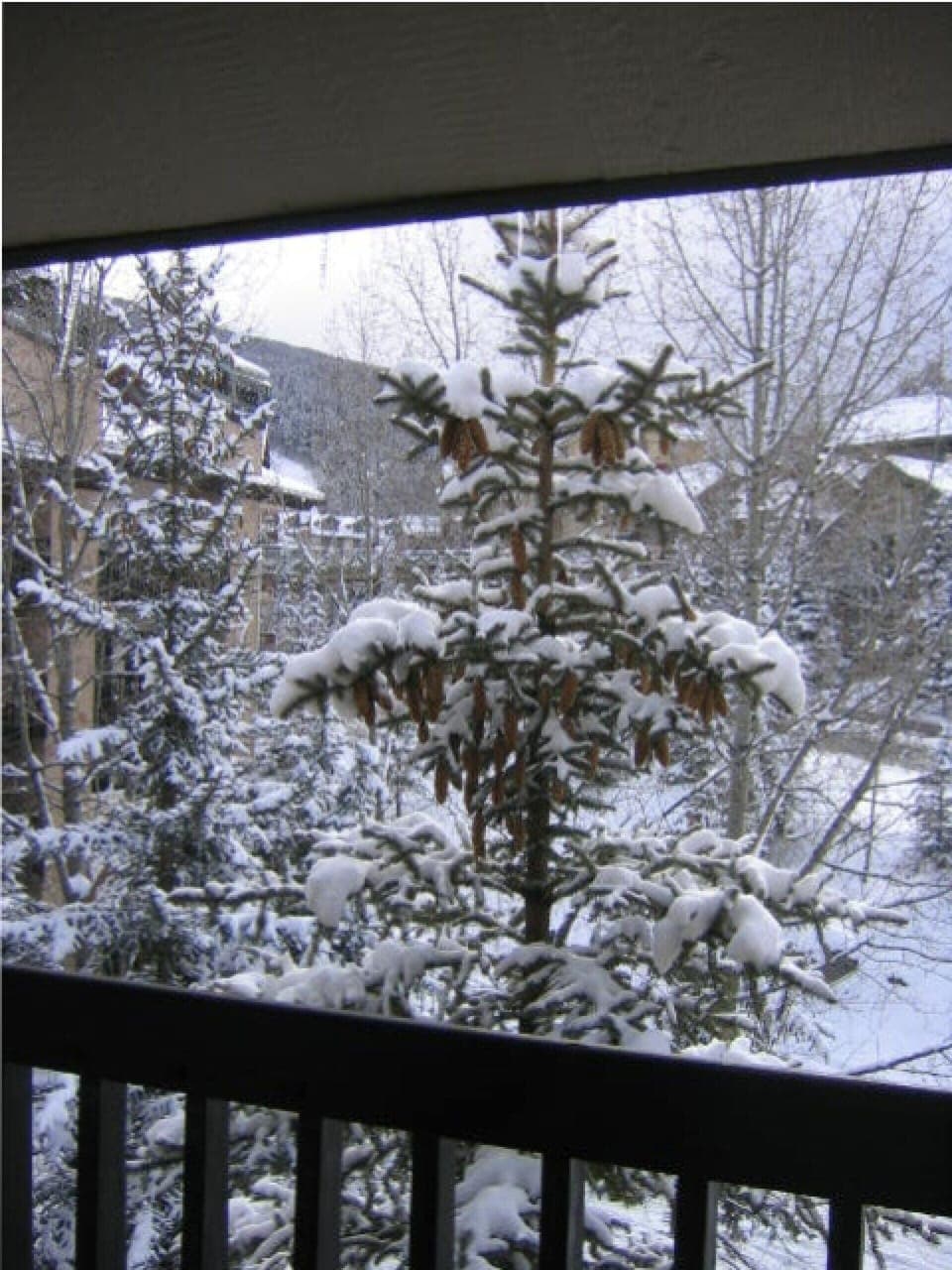 Winter view from balcony- slopes visible in background