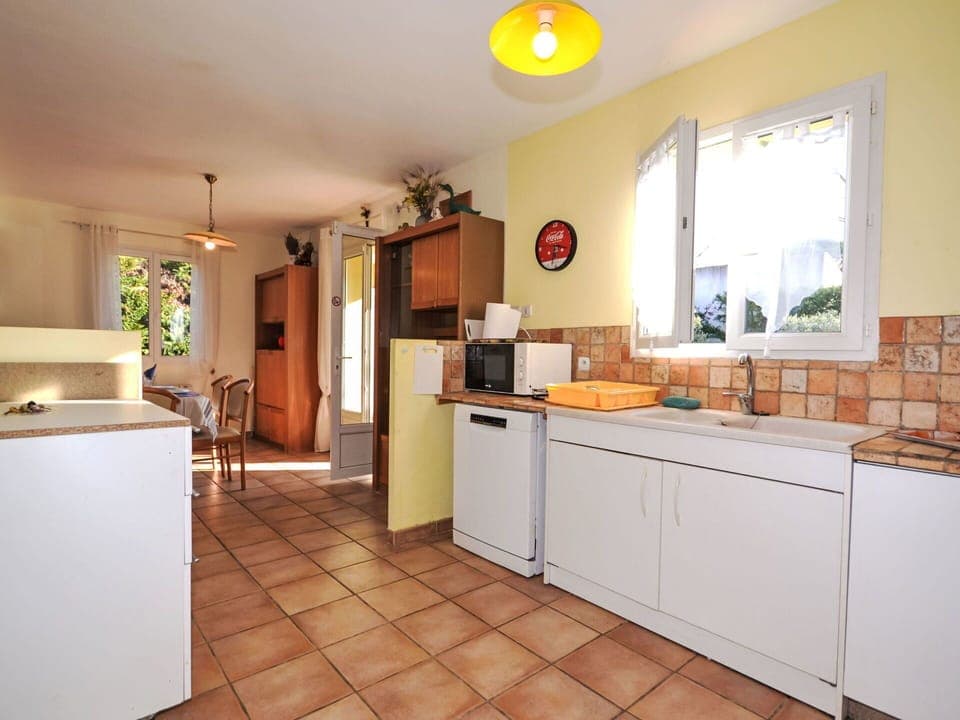 Kitchen, Countertop, Furniture, Flooring, Interior Design, Major Appliance, Kitchen Appliance, Floor, Cabinetry, Room