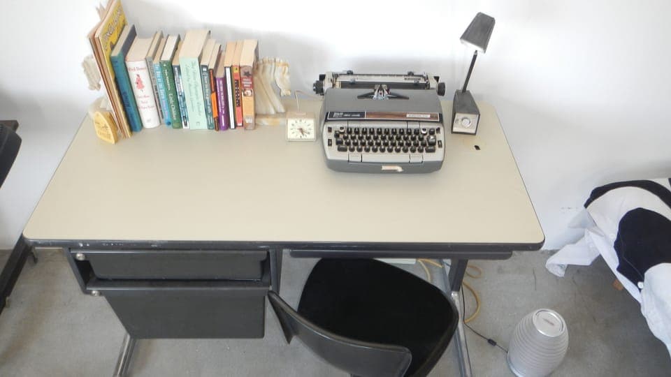 Desk with typewriter & books for your use during your stay.