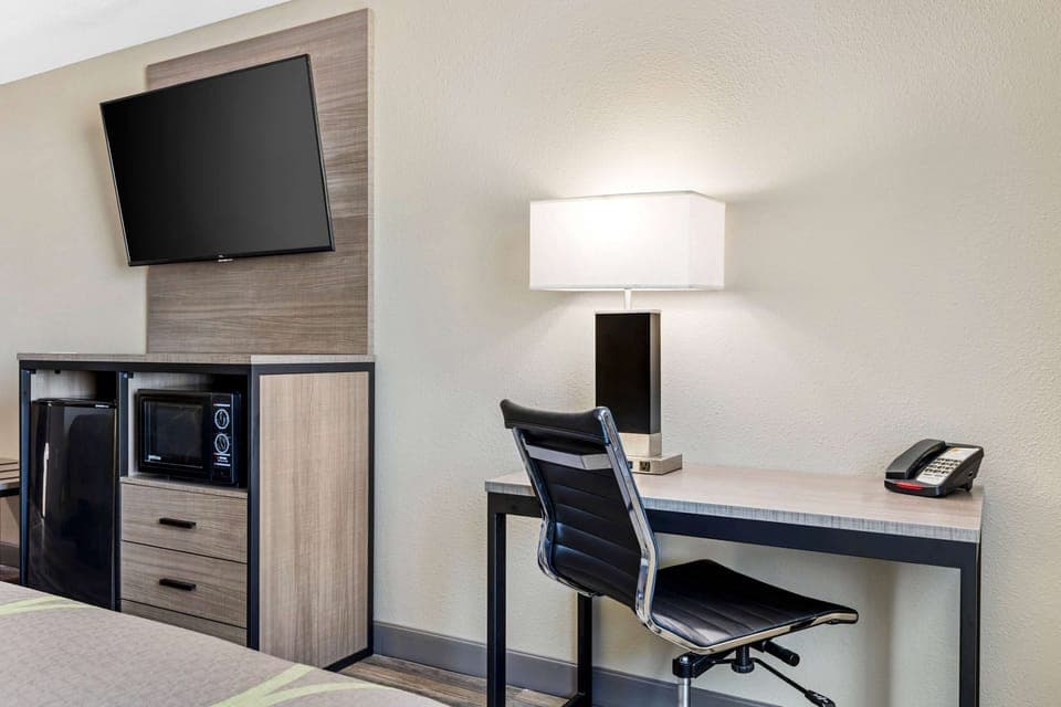 Premium bedding, pillowtop beds, desk, laptop workspace