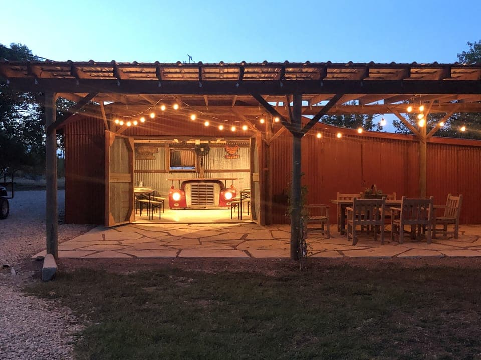 Party Barn at night with porch and party lights