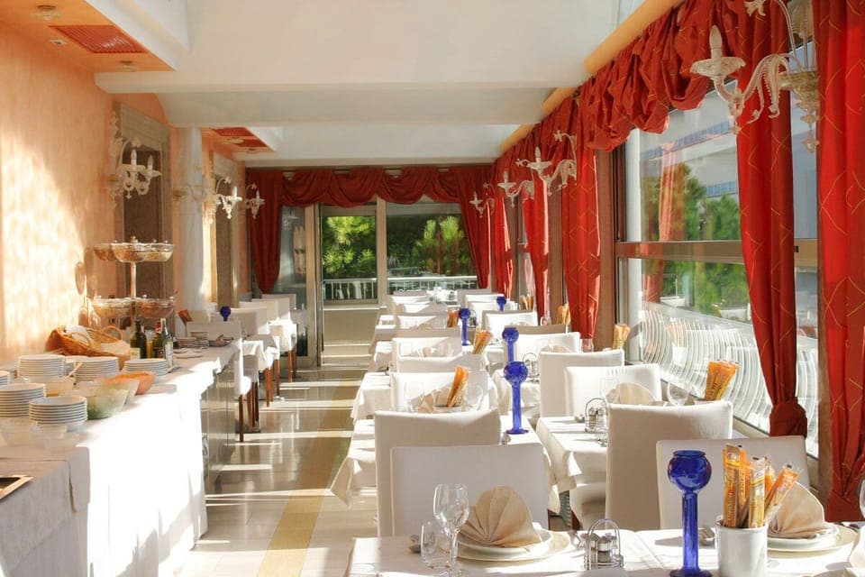 Breakfast, lunch, dinner served; beach views