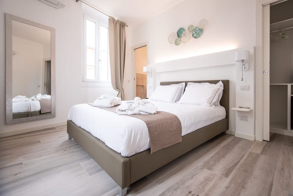 Premium bedding, down comforters, memory foam beds, minibar