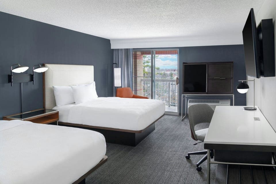 Room, 2 Queen Beds, Non Smoking | Pillowtop beds, desk, blackout drapes, iron/ironing board