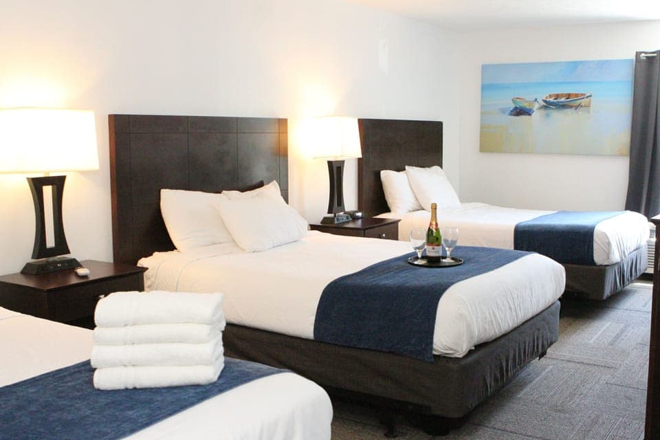 Triple Room (3 Queen Beds) | Desk, iron/ironing board, free WiFi, bed sheets