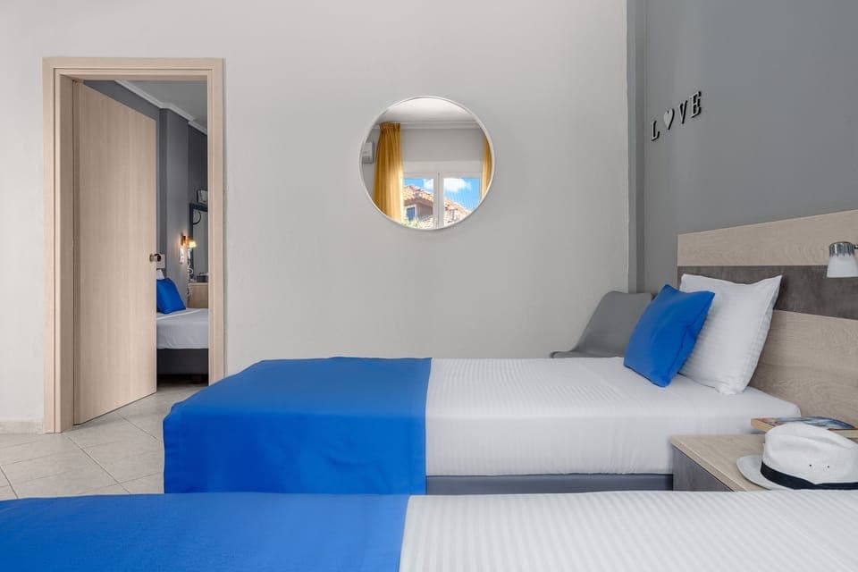 Family Suite, 2 Bedrooms, Connecting Rooms | In-room safe, desk, blackout drapes, iron/ironing board