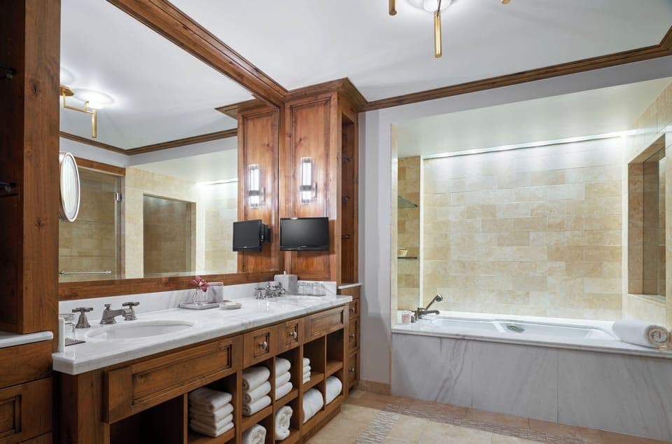 Designer toiletries, hair dryer, bathrobes, slippers
