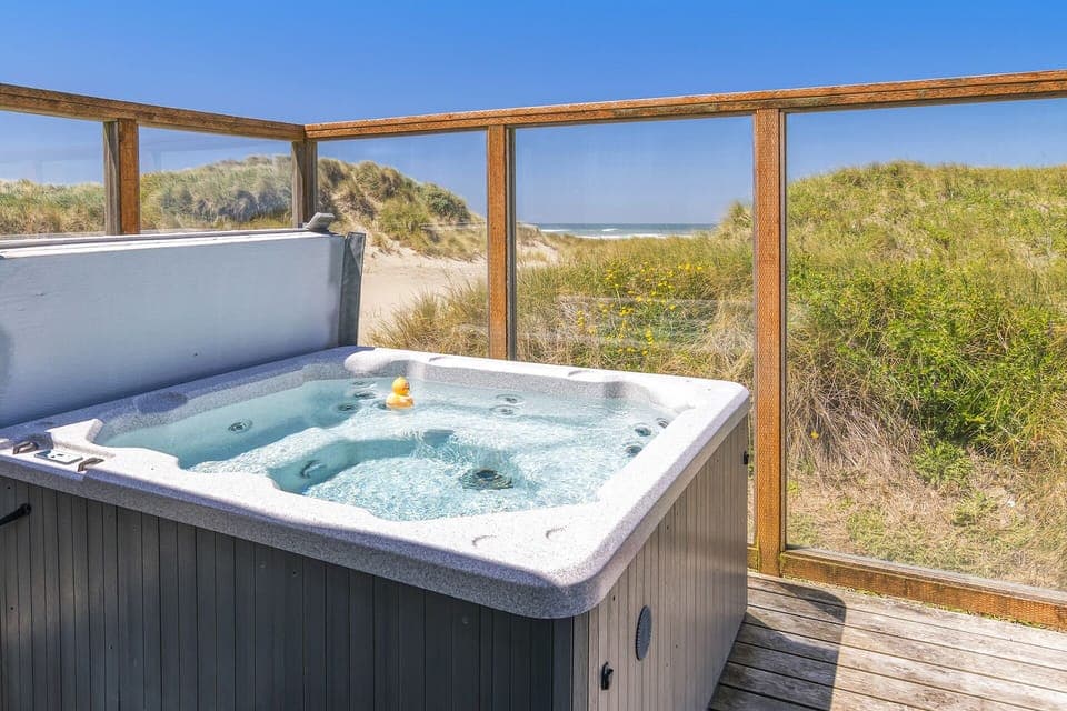 Listen to the sounds of the crashing waves from the hot tub.