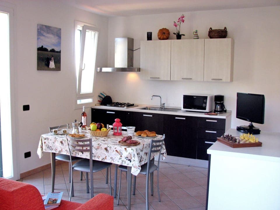 Cozy Kitchen & Living Room: TV SAT and Sofabed for two persons