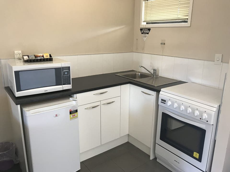 Family Suite | Private kitchen | Fridge, microwave, coffee/tea maker