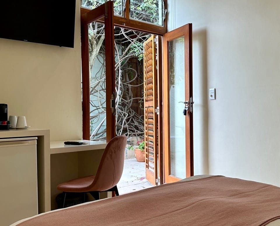 Basic Double Room | Minibar, in-room safe, individually decorated, individually furnished